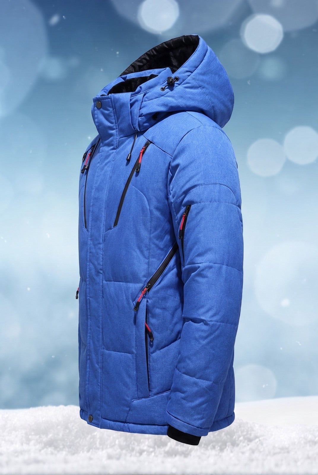 Blue padded winter jacket with hood, shown on mannequin in snow | Chaps London