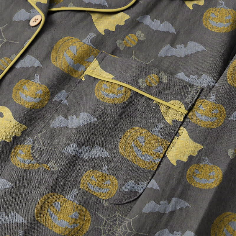 Gray pyjama shirt with yellow pumpkin and bat print, close-up view | Chaps London