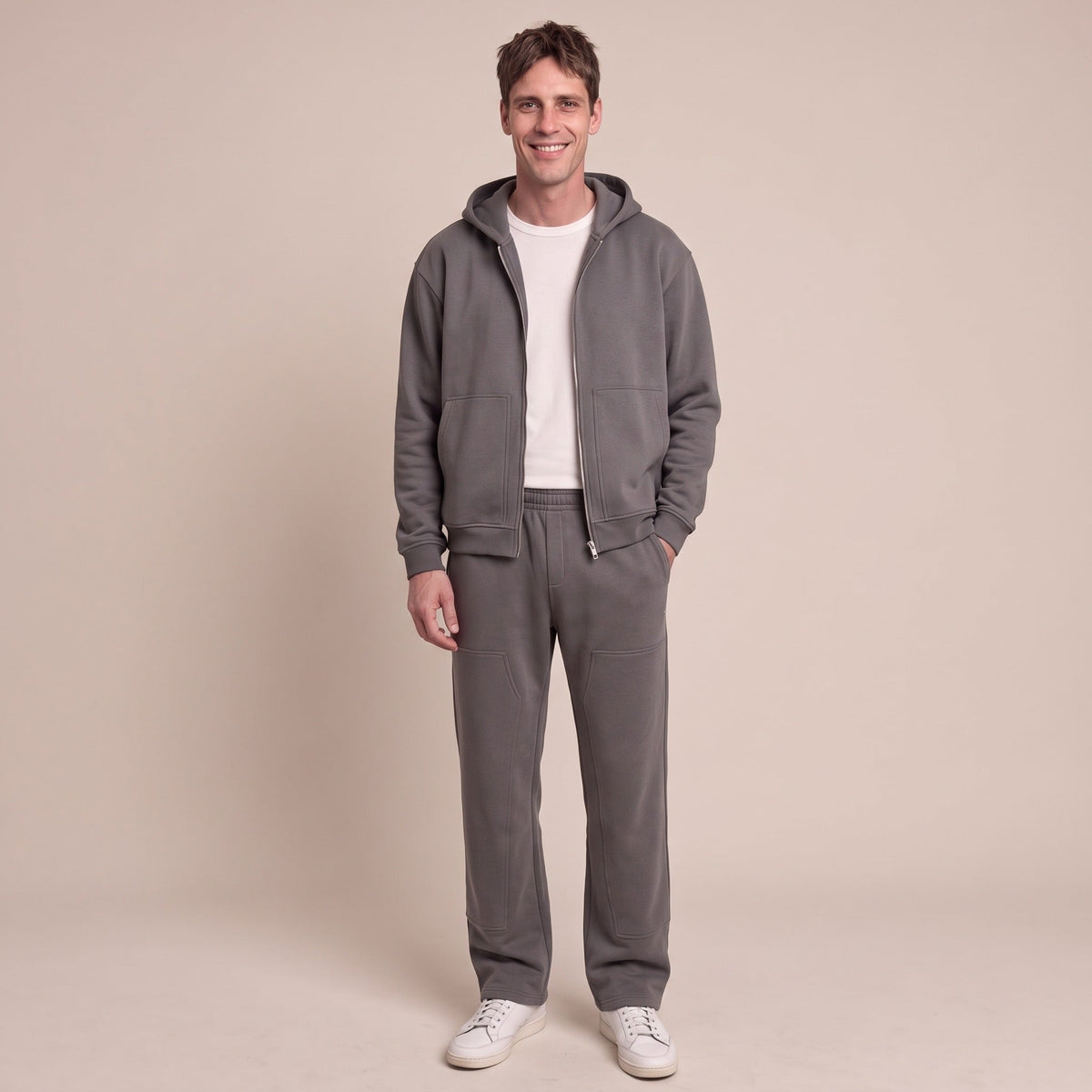 Man wearing dark grey zip hoodie and matching jogger tracksuit | Chaps London