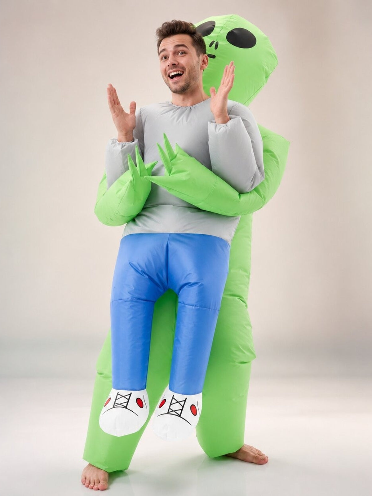Inflatable alien costume that looks like an alien carrying you