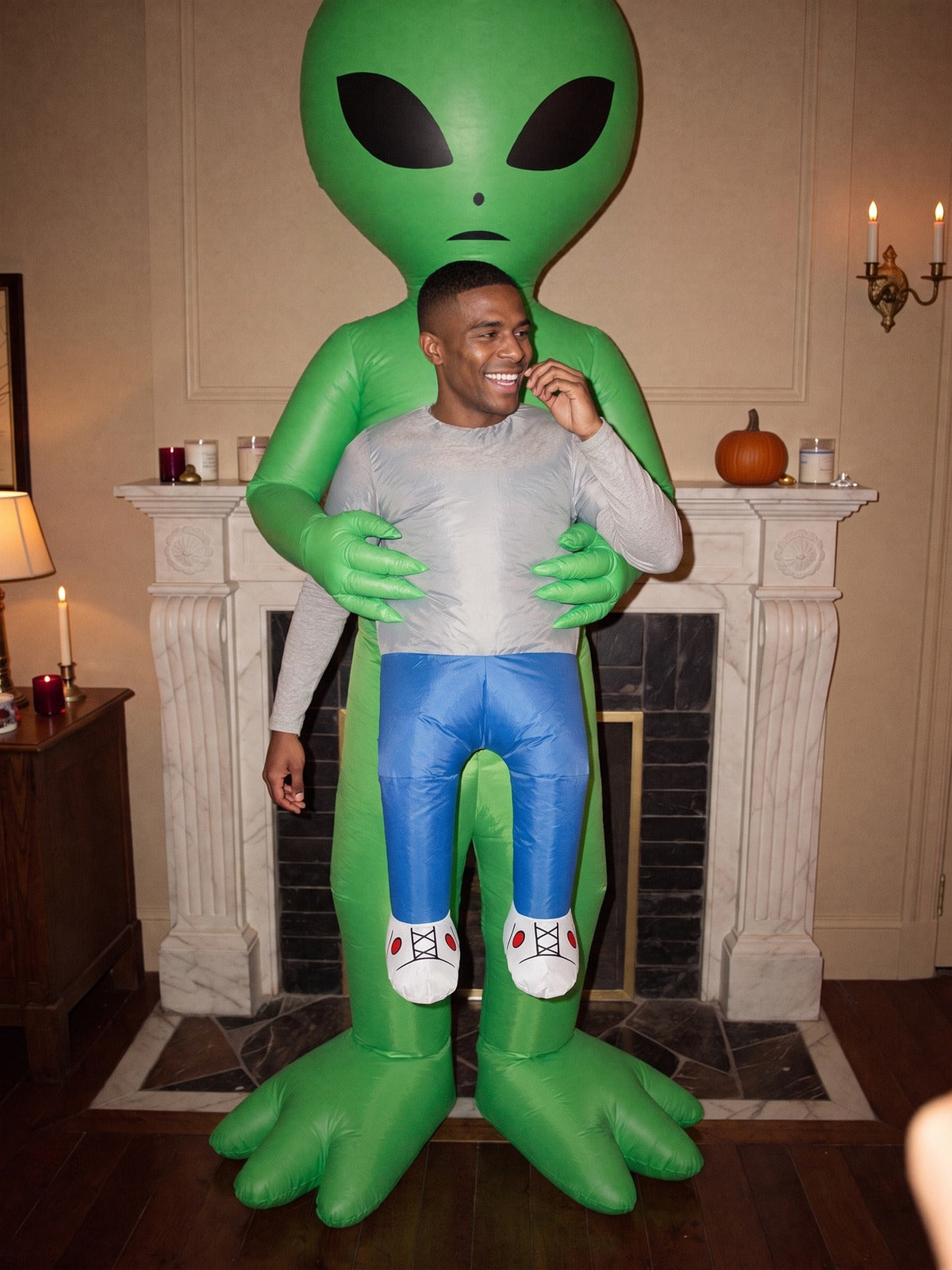 House model wearing the inflatable alien costume at a party