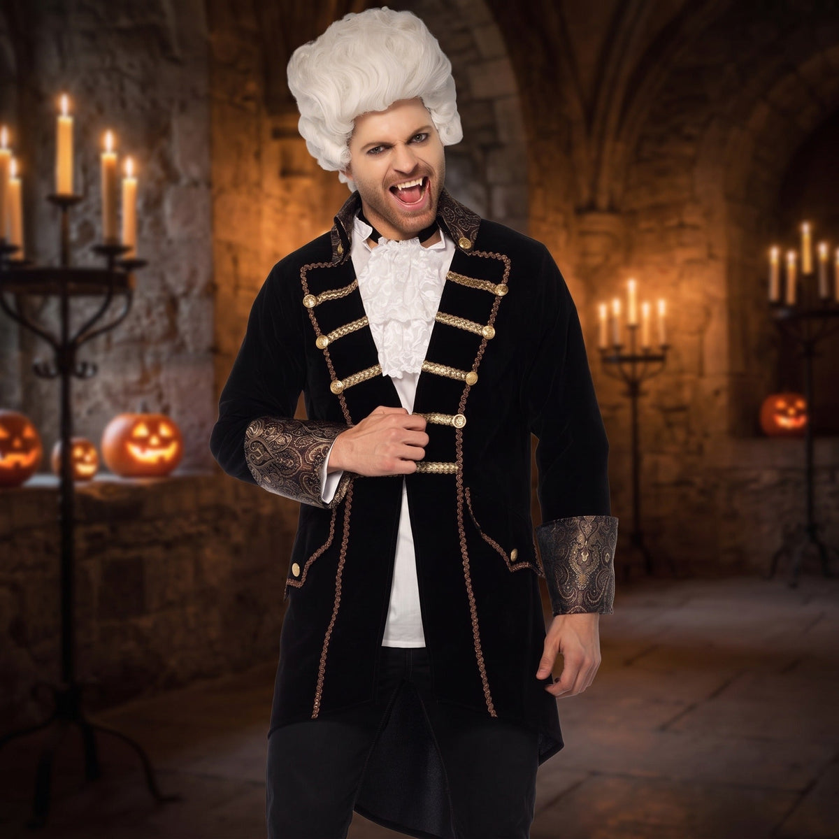 Man wearing black velvet vampire jacket with gold trim and white wig | Chaps London