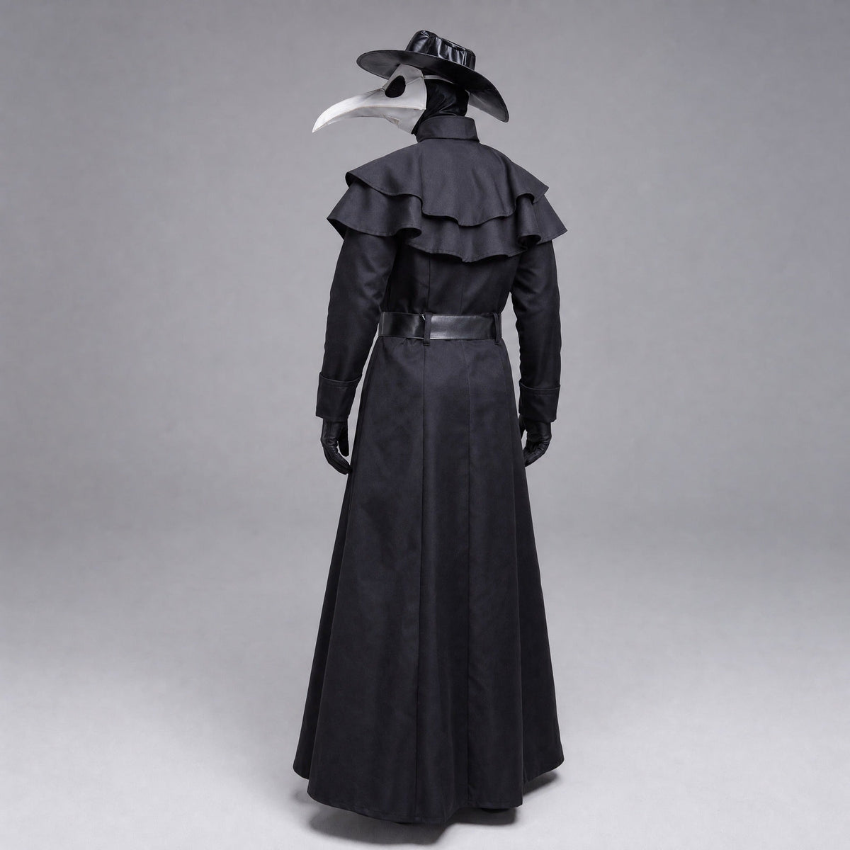 Black plague doctor costume with beak mask, hat, and ruffled cape, worn by mannequin | Chaps London