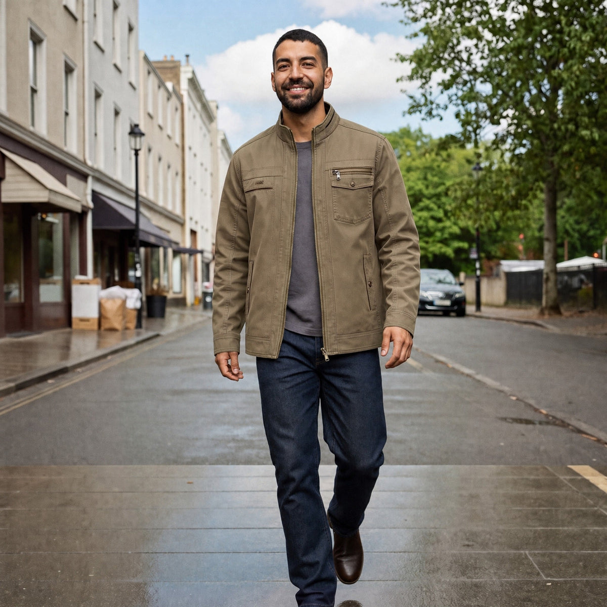 Man wearing olive cotton field jacket with dark jeans, walking outdoors | Chaps London
