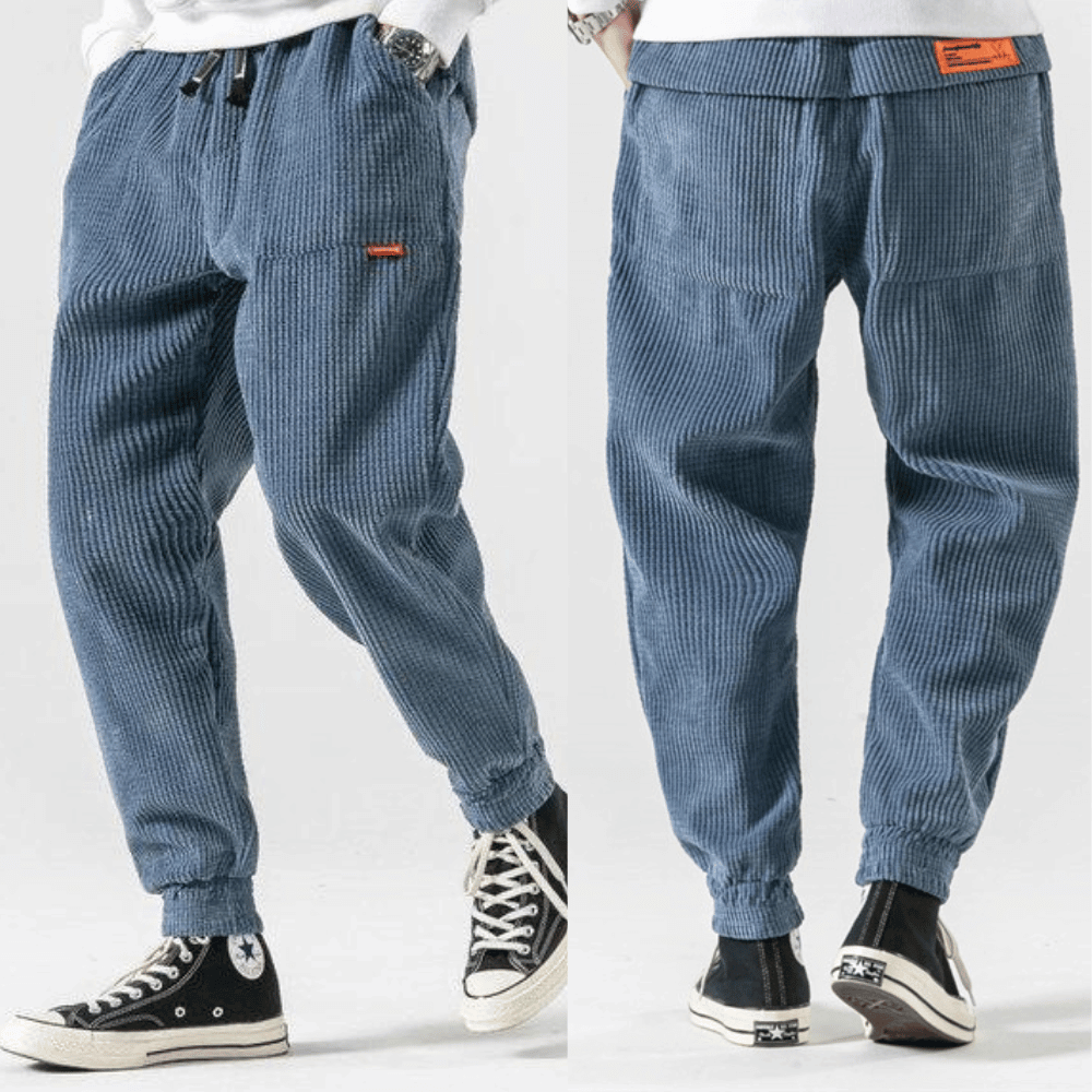 Front and back view of the blue corduroy trousers with elasticated cuffs