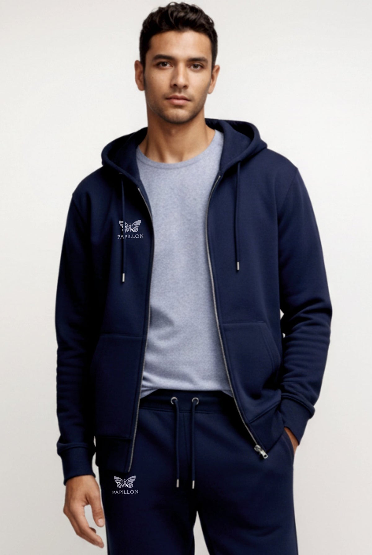 Man in the open navy zip hoodie over a grey T-shirt, with matching joggers | Chaps London