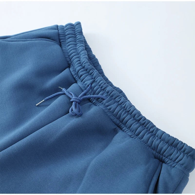 Close-up of the elasticated drawstring waistband on the joggers