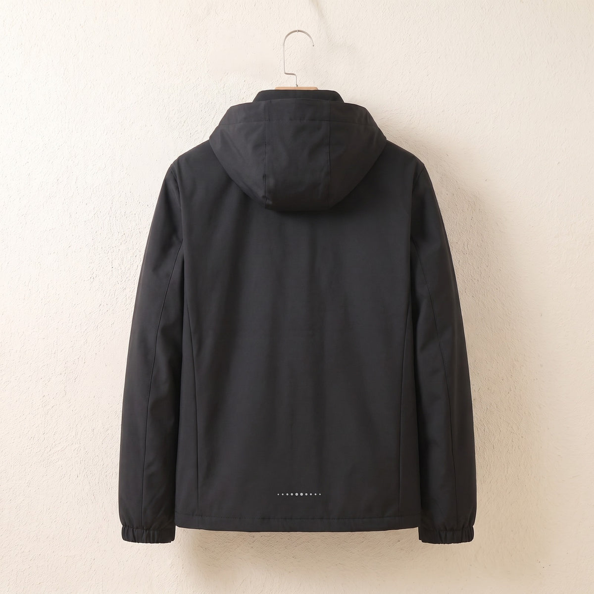 Black waterproof jacket, back view