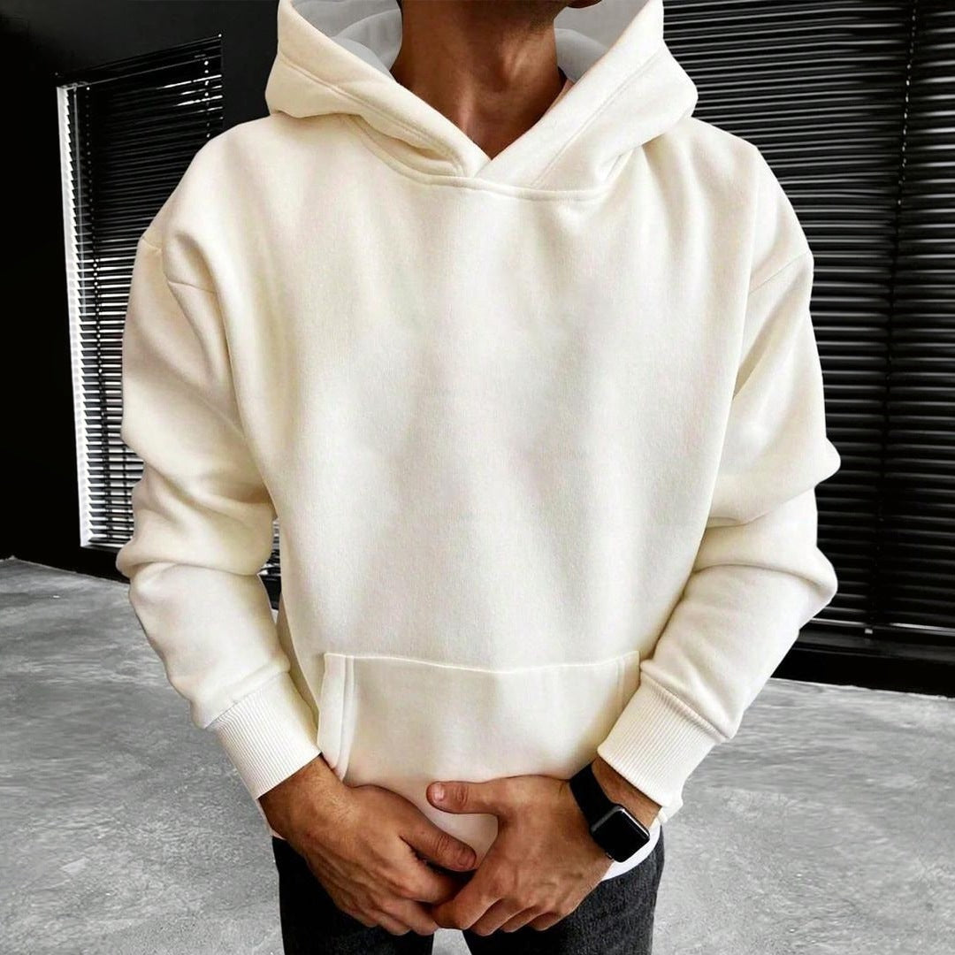 Cream plain hoodie with kangaroo pocket worn by man, hood up | Chaps London