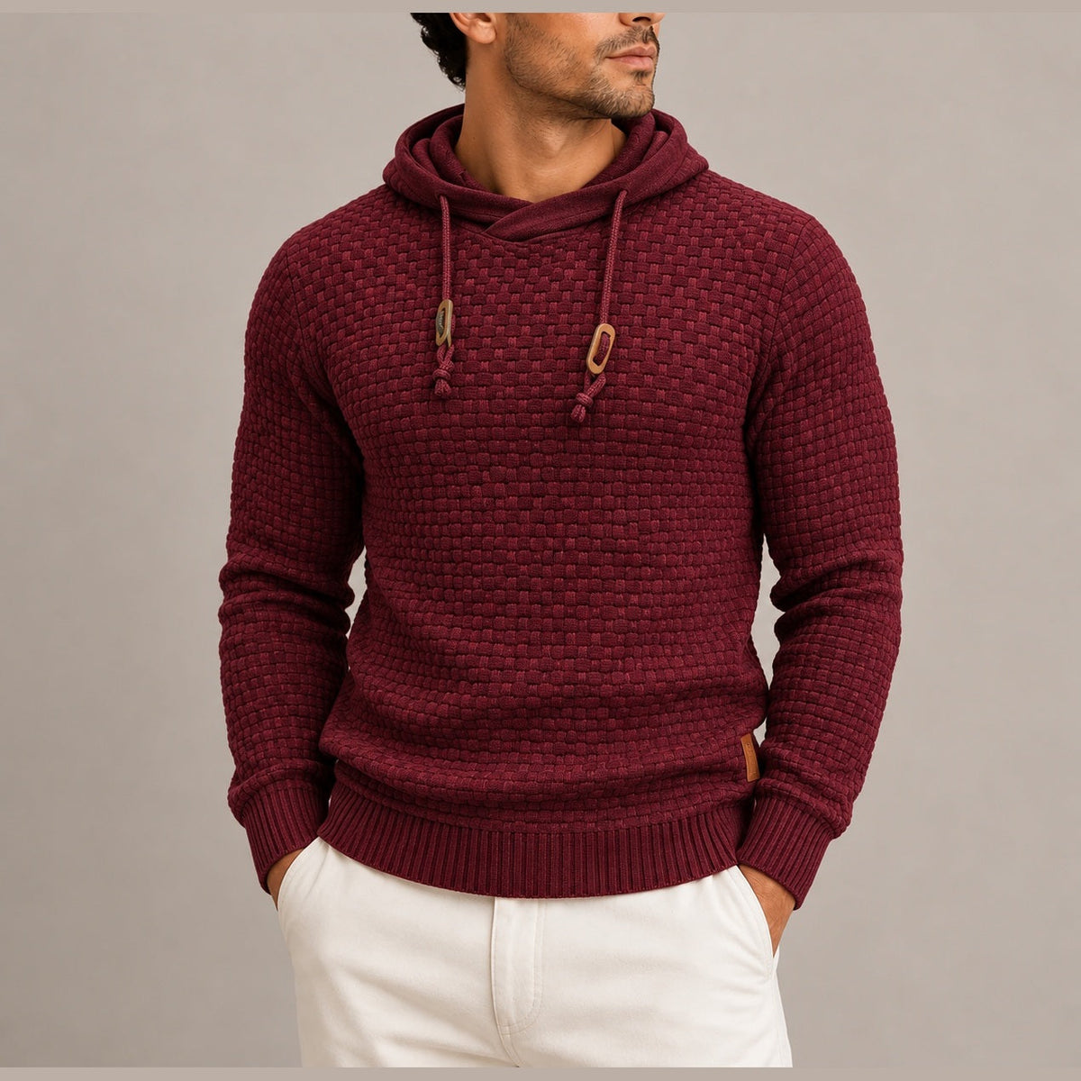 Man wearing burgundy basket weave knit hoodie with drawstring toggles, worn casually | Chaps London
