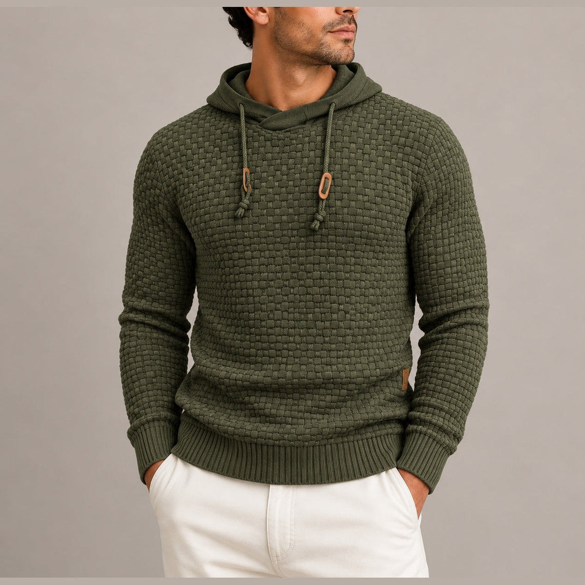 Man wearing olive green basket weave knit hoodie with wooden toggles | Chaps London