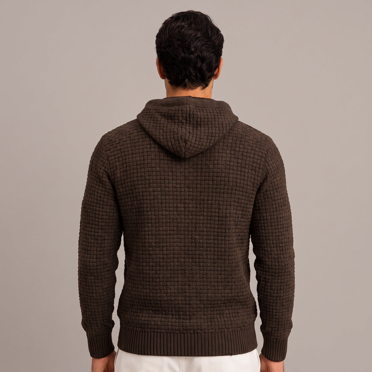 Man wearing brown basket weave knit hoodie, back view, hood up | Chaps London