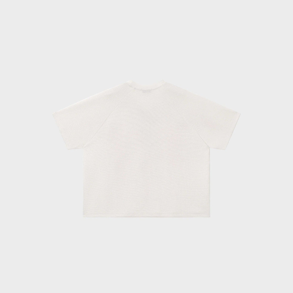 Oversized white waffle-textured T-shirt, back view, shown flat on display | Chaps London