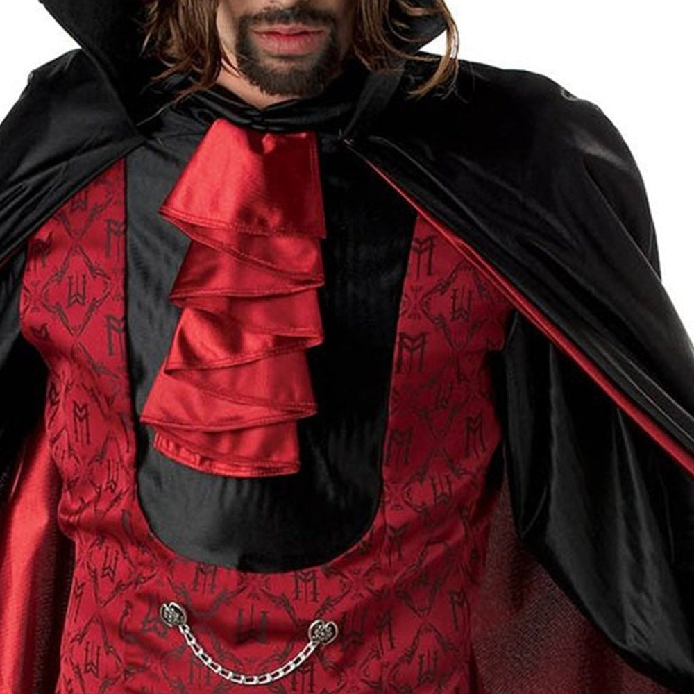 Man wearing red patterned waistcoat with ruffled cravat and black lined cape | Chaps London