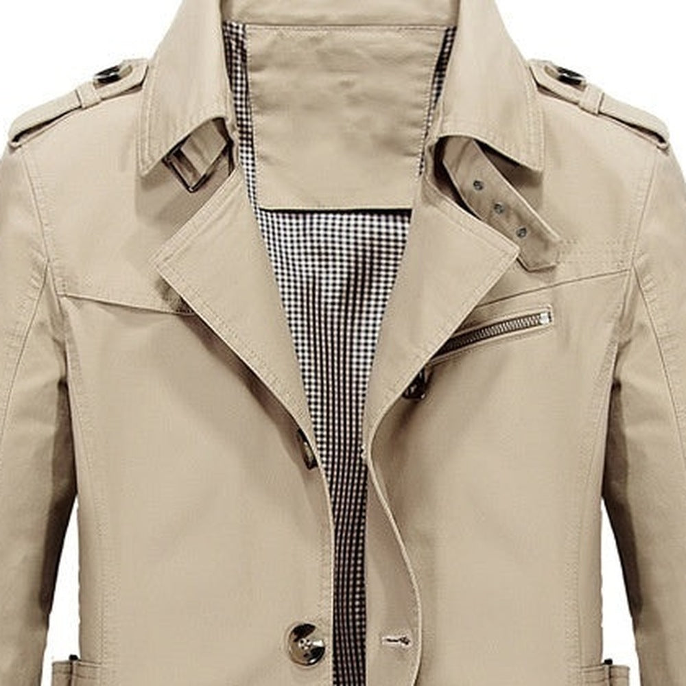 Beige trench coat close-up showing lapel, buttons, epaulette, and plaid lining | Chaps London