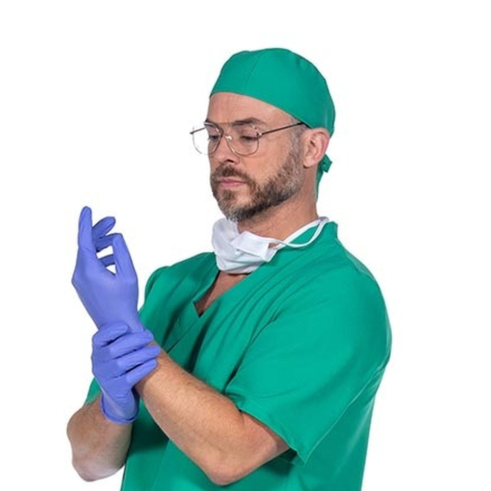 Man wearing green scrub costume with cap, mask, and purple gloves | Chaps London
