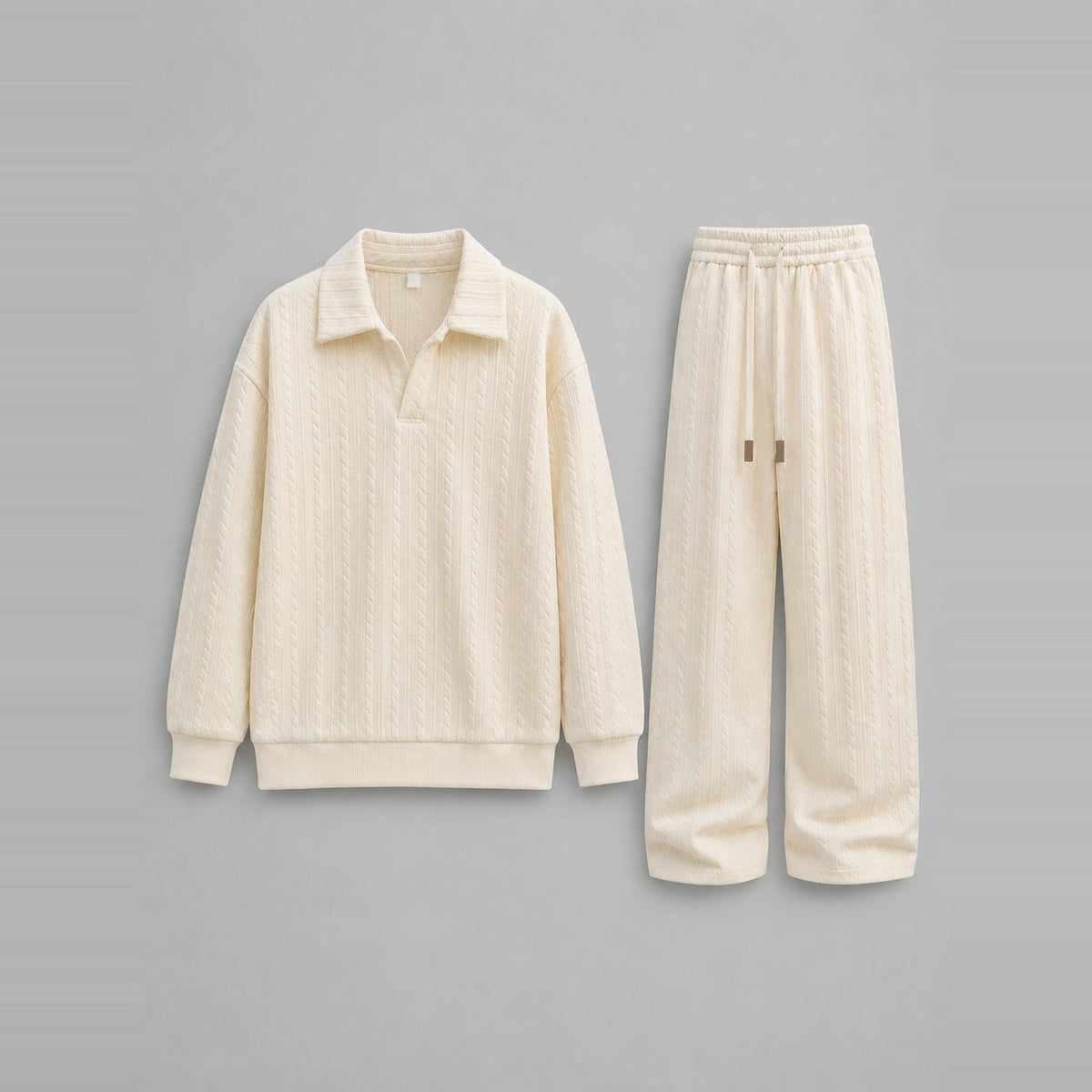 Cream cable-textured collared sweatshirt and wide-leg trousers, laid flat | Chaps London