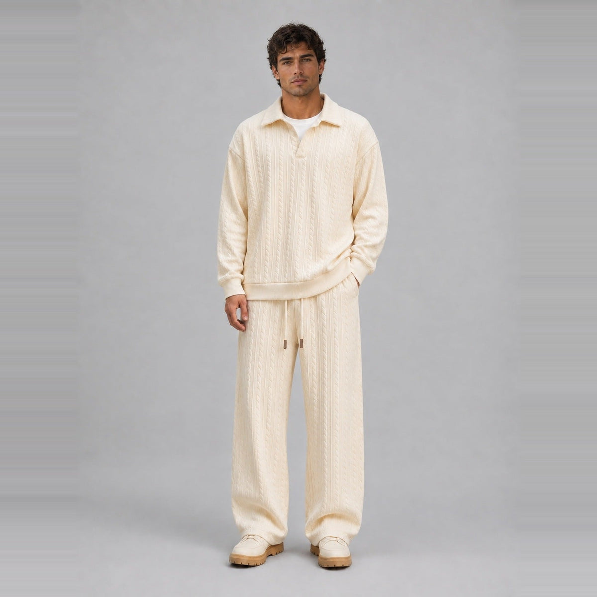 Man wearing cream cable-textured collared top and matching wide-leg trousers | Chaps London