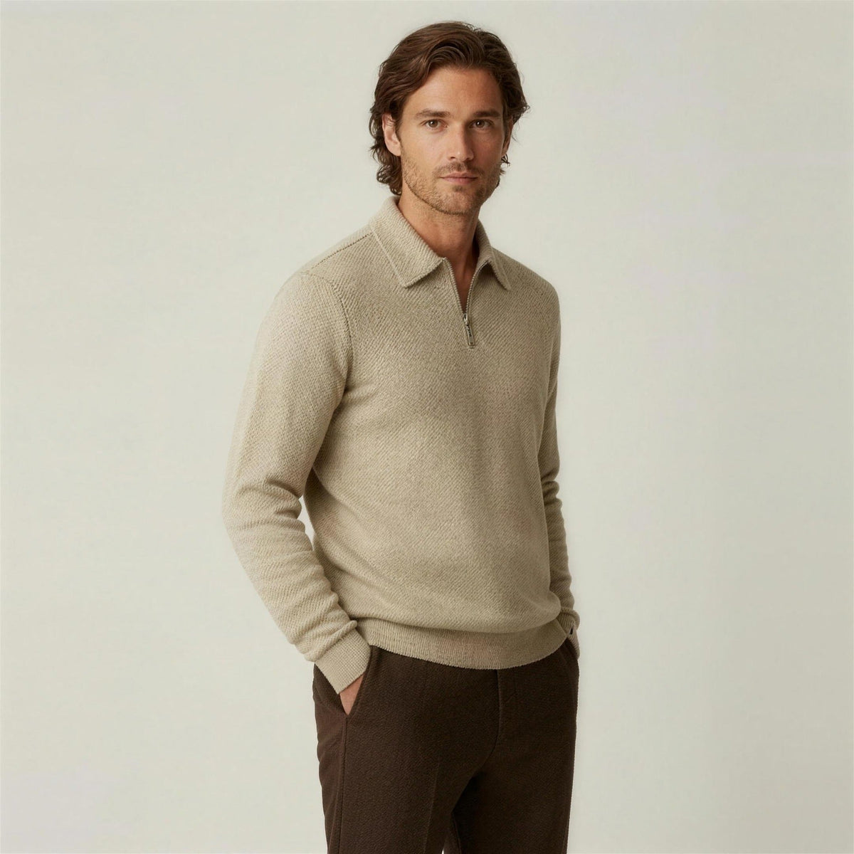 Man wearing beige textured knit half-zip polo jumper with brown trousers | Chaps London
