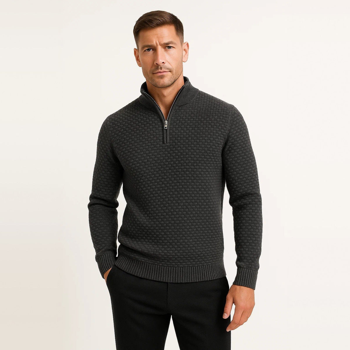 Man wearing dark grey waffle knit quarter zip jumper with black trousers | Chaps London