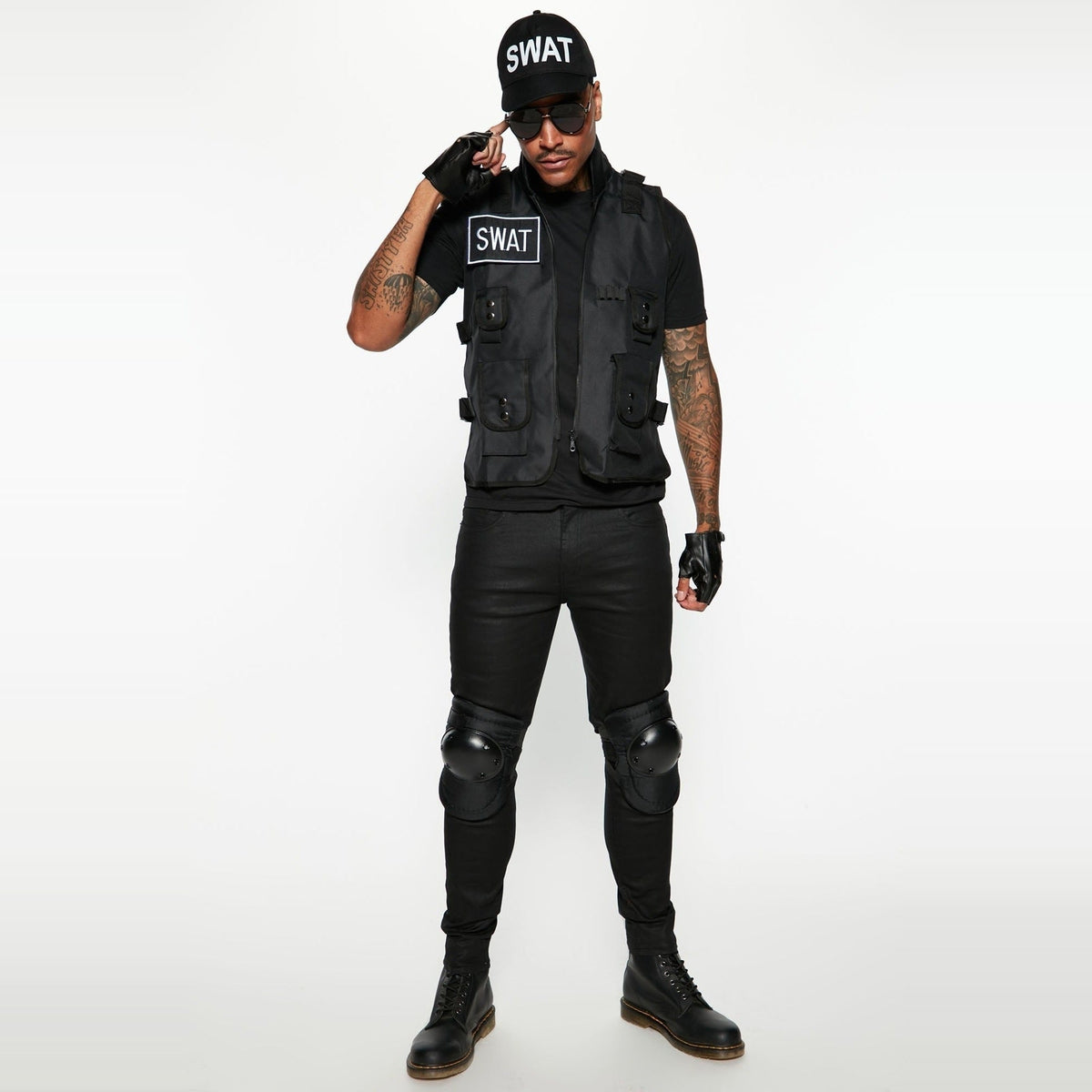 Man wearing black SWAT costume vest, cap, gloves and knee pads | Chaps London