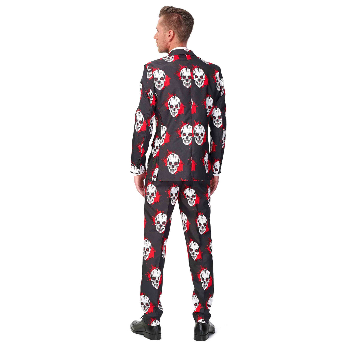 Man wearing black skull print suit jacket and trousers, back view | Chaps London