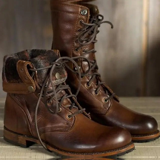 Brown lace-up boots with fold-over cuff, worn by a person | Chaps London