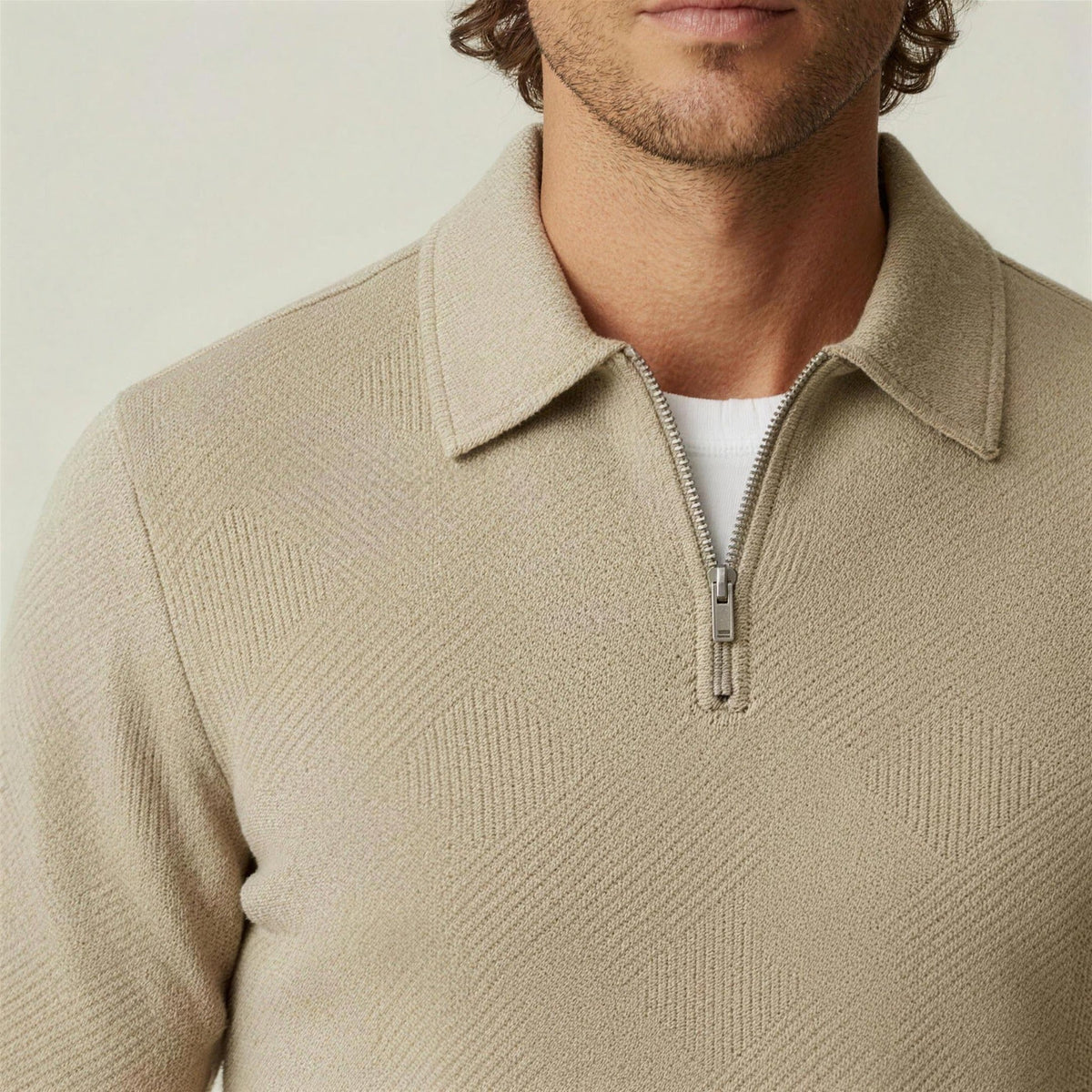 Beige textured half-zip polo sweater with diamond pattern, worn by man | Chaps London
