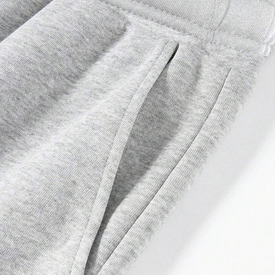 Close-up of grey jogger pocket detail and fabric texture | Chaps London