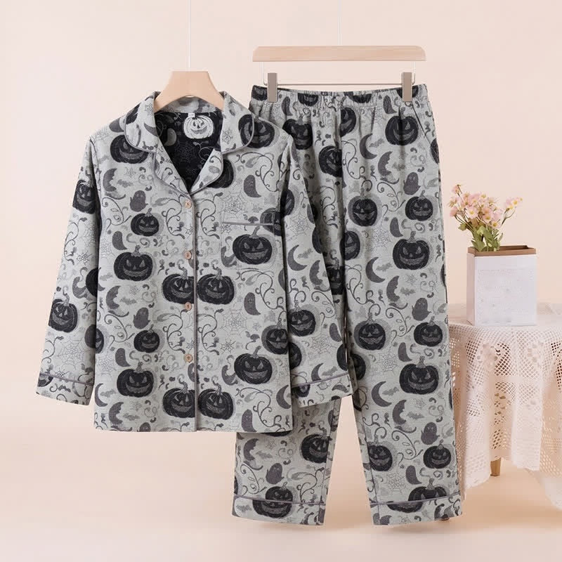 Grey pyjama set with black pumpkin print, hanger display, button-up shirt and pants | Chaps London