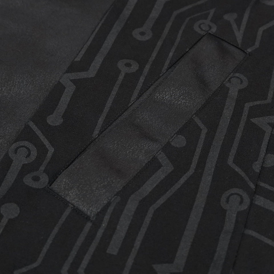 Close-up of black circuit print fabric with textured fabric panel detail | Chaps London