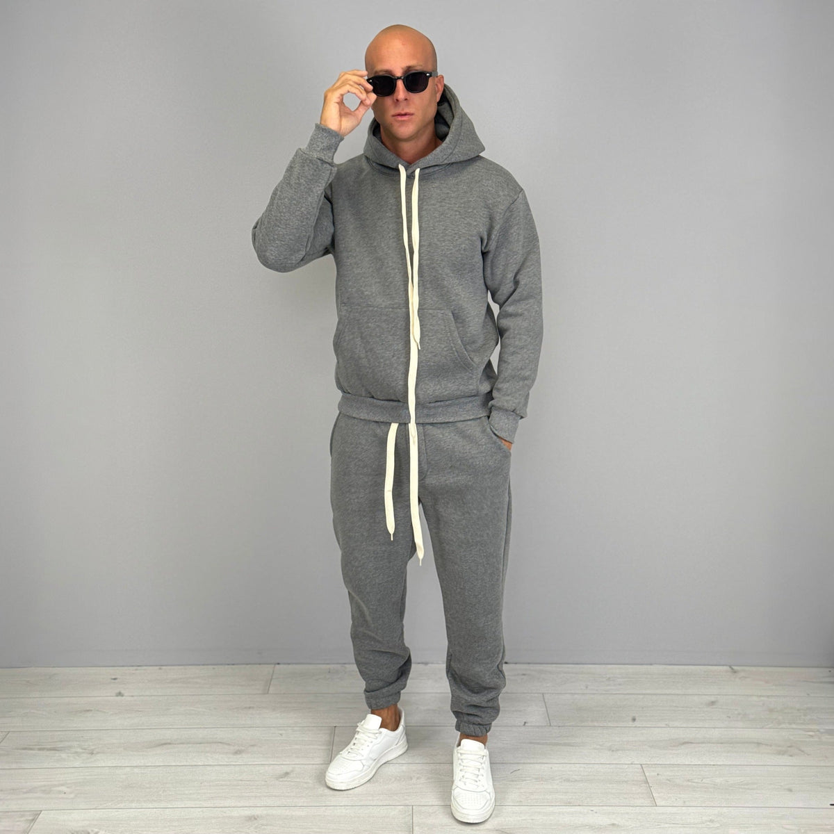 Man wearing grey hooded tracksuit with drawstring hoodie and jogger pants | Chaps London