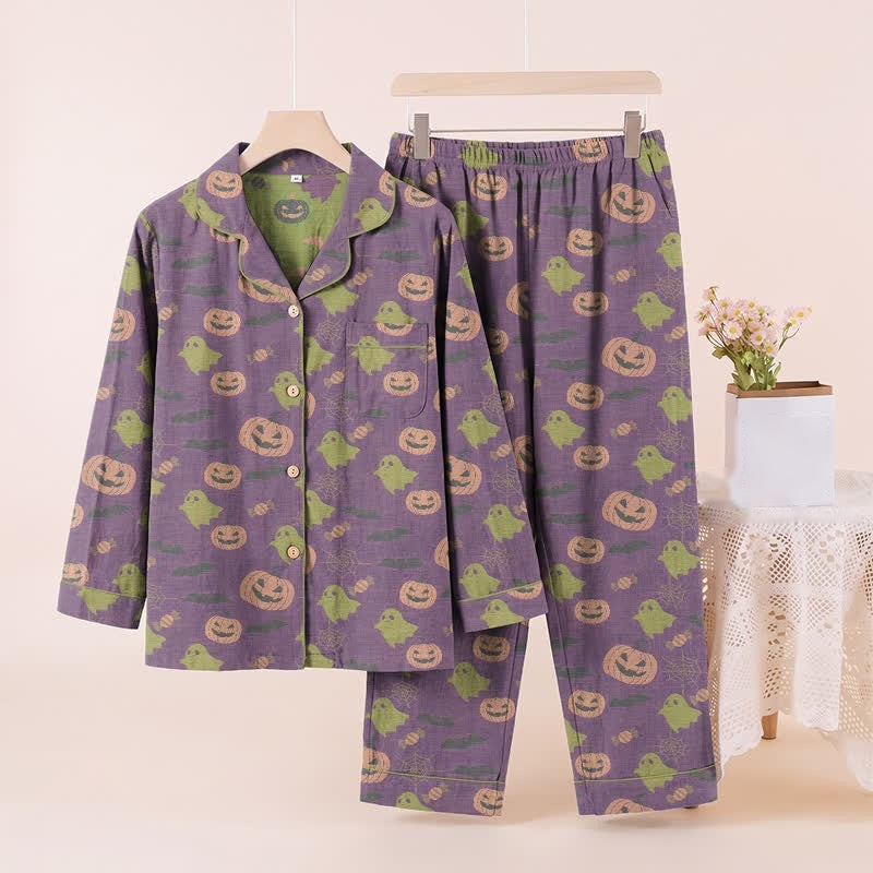 Purple pyjama set with pumpkin and ghost print, displayed on hanger | Chaps London