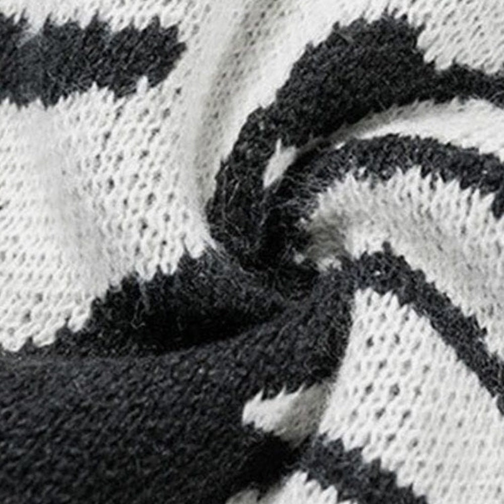 Close-up of black and white knit fabric with abstract pattern | Chaps London