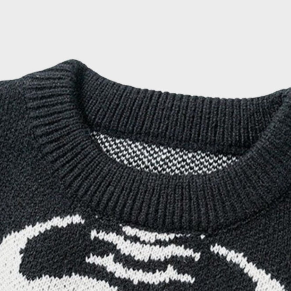 Close-up of black crew neck sweater with skeleton graphic pattern | Chaps London