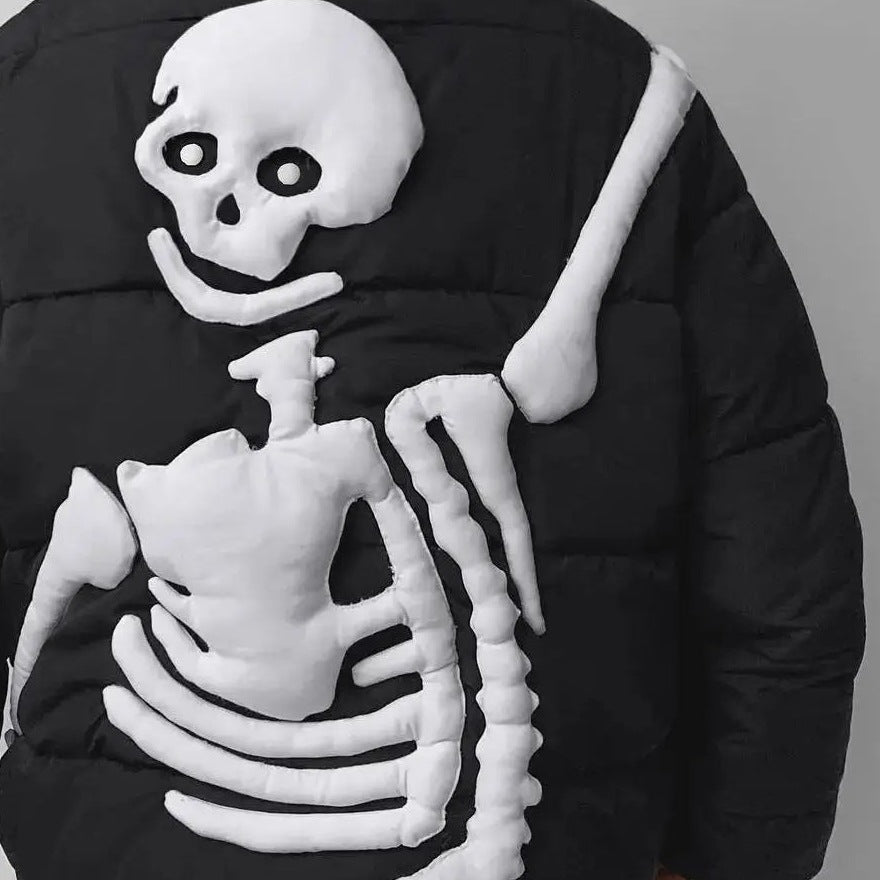 Black puffer jacket with white raised skeleton design, worn by a person | Chaps London