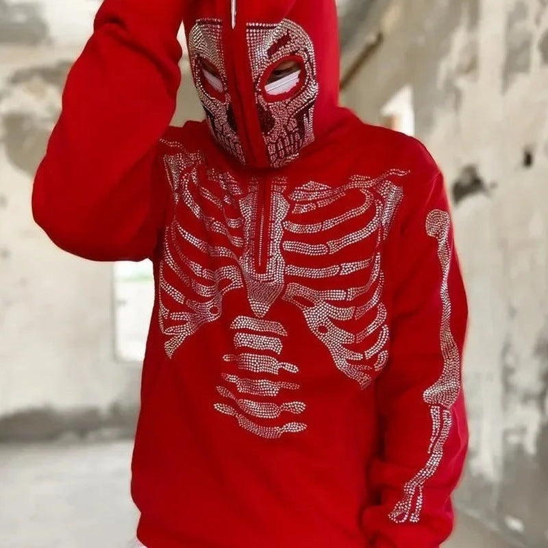 Red rhinestone skeleton hoodie with skull mask hood, worn by person outdoors | Chaps London