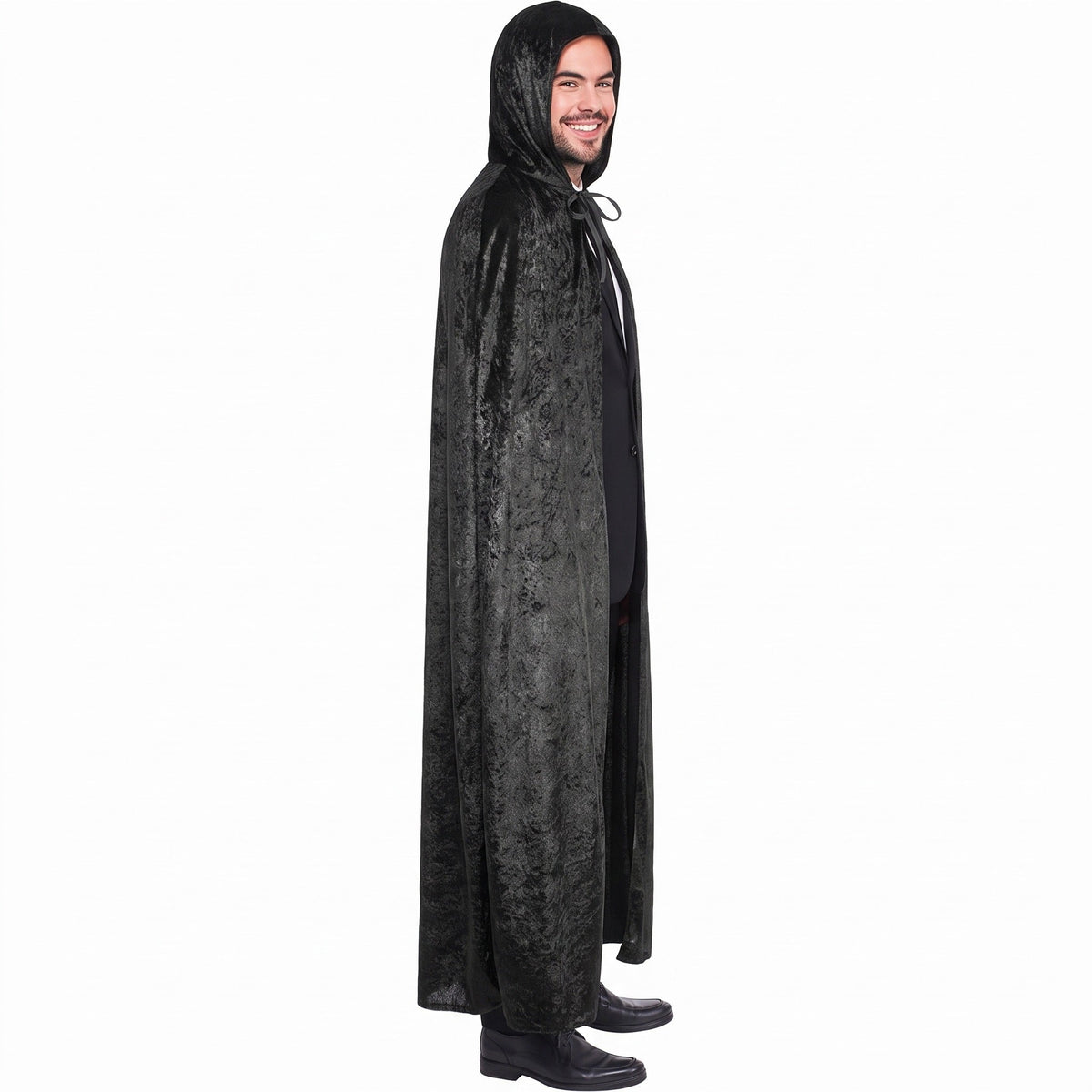 Man wearing long black hooded cape, side view, full length | Chaps London