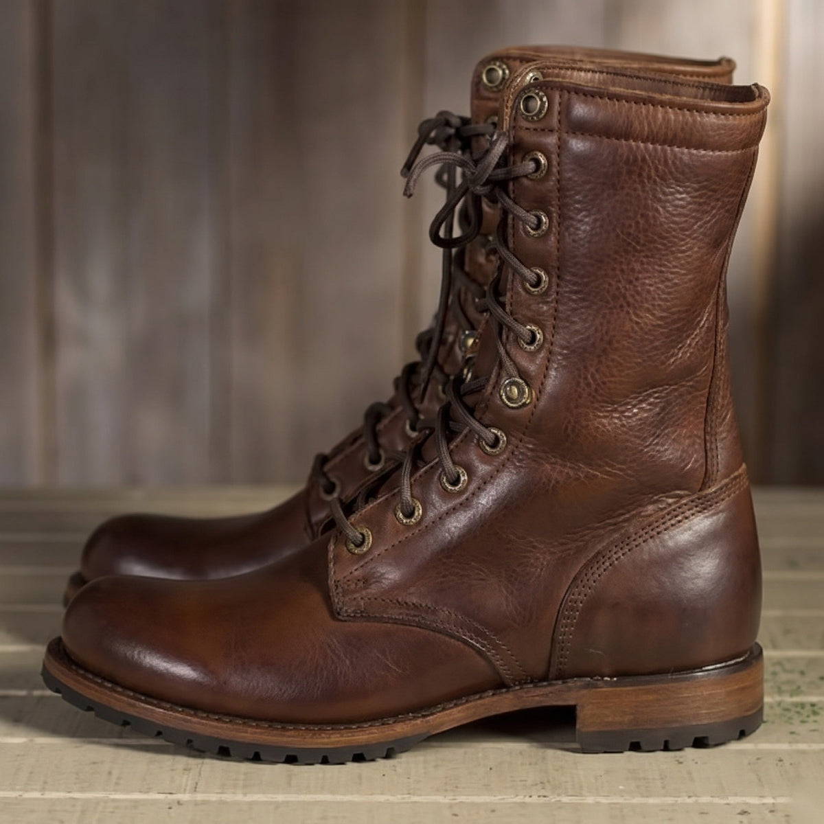 Brown lace-up boot with brass eyelets shown standing alone | Chaps London