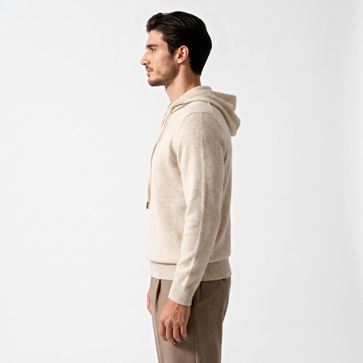 Man wearing beige knit hooded sweater, side profile view, smart casual style | Chaps London