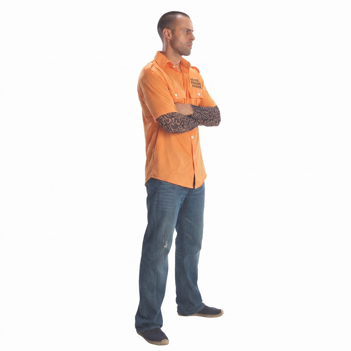 Man wearing orange prisoner costume shirt with tattoo sleeves and jeans | Chaps London