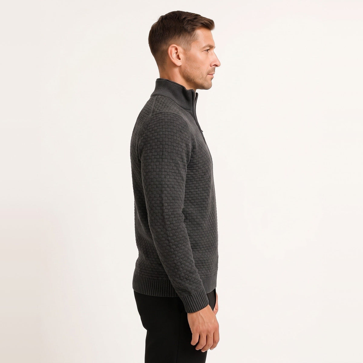 Man wearing charcoal grey waffle knit quarter zip jumper, side view | Chaps London