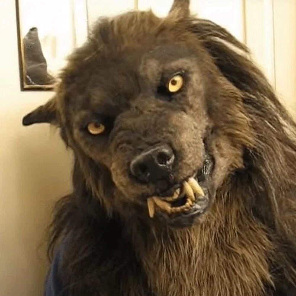 Brown werewolf mask with faux fur mane and fangs, worn by person | Chaps London