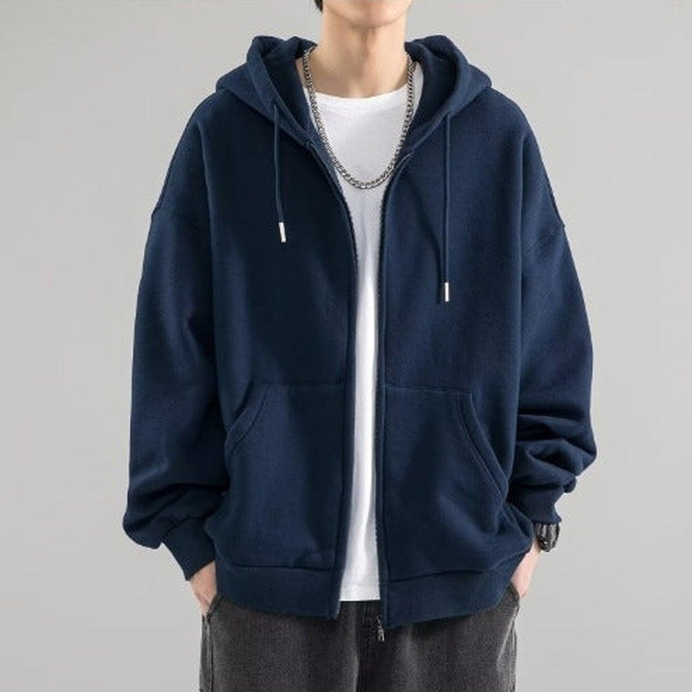 Navy blue zip-up hoodie worn by man, drawstring hood, layered over white shirt | Chaps London