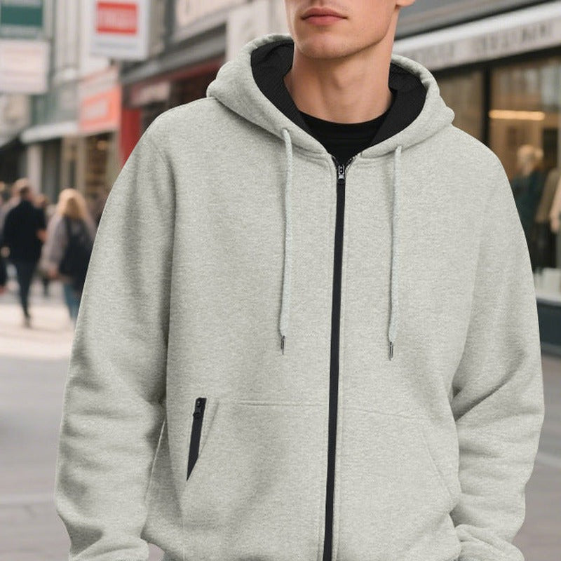 Men's oversized zip-up hoodie in light grey, worn, front view