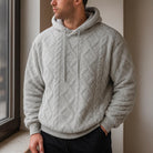Men's quilted teddy fleece hoodie in grey, worn, front view