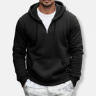 Men's quarter-zip hoodie in black, worn, front view