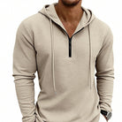 Men's textured quarter-zip hoodie in beige, worn, front view