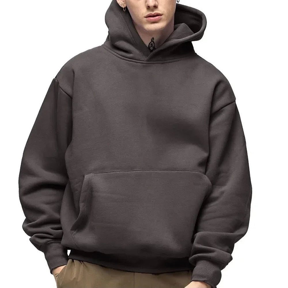 Men's heavyweight cotton hoodie in dark grey, worn, front view