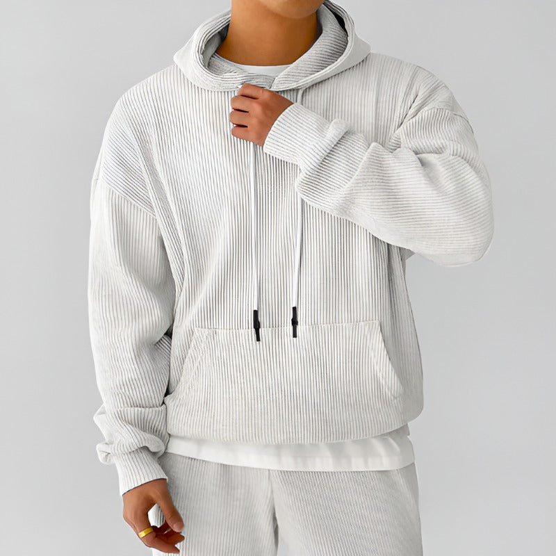Men's ribbed oversized hoodie in white, worn, front view